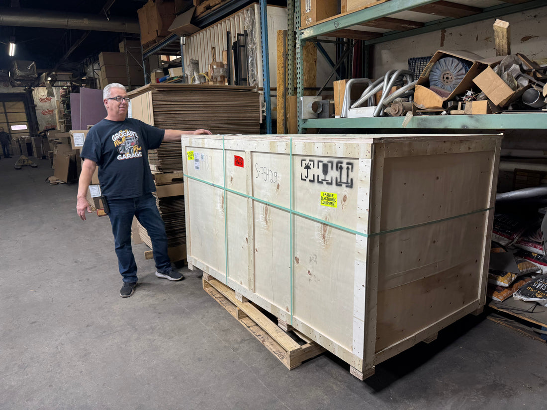 Our landlord next to the new laser crate